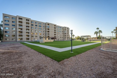 Beautifully maintained end unit condo located in a guard-gated on Scottsdale Shadows in Arizona - for sale on GolfHomes.com, golf home, golf lot