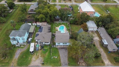 236 3rd St, San Leon, TX, is just two streets from the bay on Chapparral Rec Assoc Golf Club in Texas - for sale on GolfHomes.com, golf home, golf lot