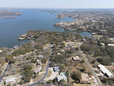 Gently sloping, wooded double lot totalling .67 acre in the on Apple Rock Golf Course - Horseshoe Bay in Texas - for sale on GolfHomes.com, golf home, golf lot