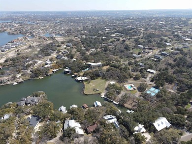Gently sloping, wooded double lot totalling .67 acre in the on Apple Rock Golf Course - Horseshoe Bay in Texas - for sale on GolfHomes.com, golf home, golf lot