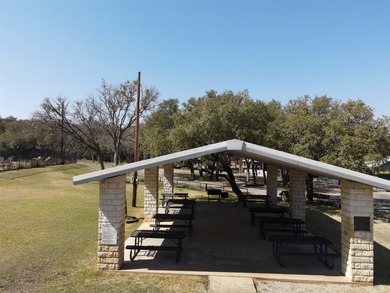Gently sloping, wooded double lot totalling .67 acre in the on Apple Rock Golf Course - Horseshoe Bay in Texas - for sale on GolfHomes.com, golf home, golf lot
