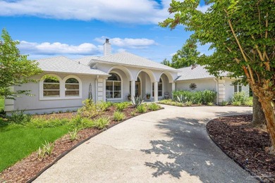 Situated on an oversized corner lot with lush landscaping, this on The Club At Hidden Creek in Florida - for sale on GolfHomes.com, golf home, golf lot