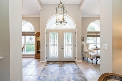 Situated on an oversized corner lot with lush landscaping, this on The Club At Hidden Creek in Florida - for sale on GolfHomes.com, golf home, golf lot