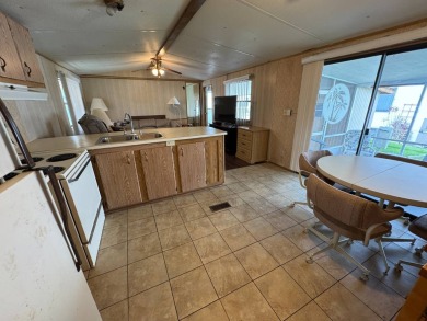 Priced to Sell in Hidden Golf - A Highly Sought-After 55+ Gated on Lake Henry Golf Club in Florida - for sale on GolfHomes.com, golf home, golf lot