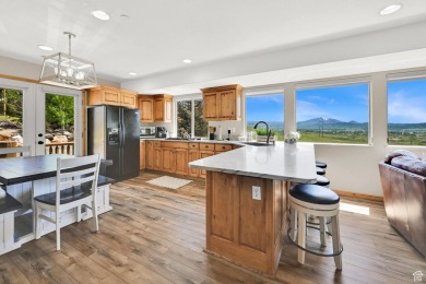 Rare turn key end-unit with unobstructed views! This beautifully on Wolf Creek Golf Club and Resort in Utah - for sale on GolfHomes.com, golf home, golf lot