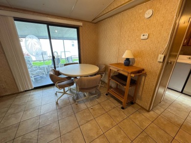 Priced to Sell in Hidden Golf - A Highly Sought-After 55+ Gated on Lake Henry Golf Club in Florida - for sale on GolfHomes.com, golf home, golf lot