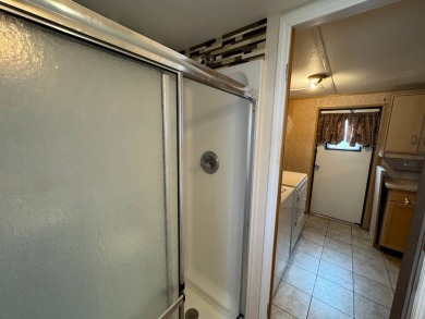 Priced to Sell in Hidden Golf - A Highly Sought-After 55+ Gated on Lake Henry Golf Club in Florida - for sale on GolfHomes.com, golf home, golf lot