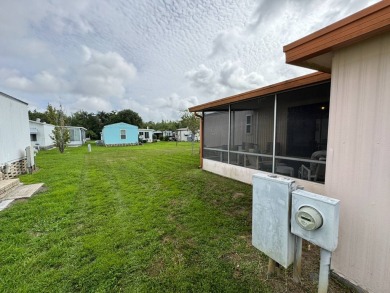 Priced to Sell in Hidden Golf - A Highly Sought-After 55+ Gated on Lake Henry Golf Club in Florida - for sale on GolfHomes.com, golf home, golf lot