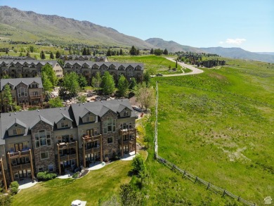 Rare turn key end-unit with unobstructed views! This beautifully on Wolf Creek Golf Club and Resort in Utah - for sale on GolfHomes.com, golf home, golf lot
