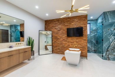 Luxury oasis in prestigious Breakers West Golf & Country Club on Breakers Rees Jones Course in Florida - for sale on GolfHomes.com, golf home, golf lot