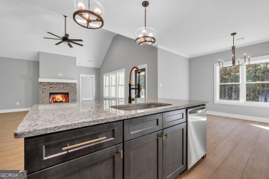 Nestled on the corner lot is an absolute gorgeous new on Canongate At Healy Point Country Club in Georgia - for sale on GolfHomes.com, golf home, golf lot