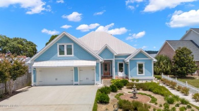 CUSTOM LAKE FRONT HOME WITH PRIVATE DOCK, BOATHOUSE FEATURING 6K on Sharks Tooth Golf Club in Florida - for sale on GolfHomes.com, golf home, golf lot