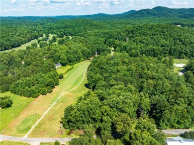 Approximately 1.25 acre gentle sloping lot with mountain views on The Rock At Jocassee in South Carolina - for sale on GolfHomes.com, golf home, golf lot