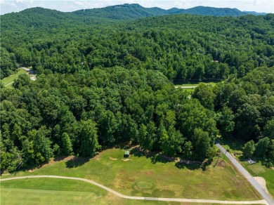 Approximately 1.25 acre gentle sloping lot with mountain views on The Rock At Jocassee in South Carolina - for sale on GolfHomes.com, golf home, golf lot