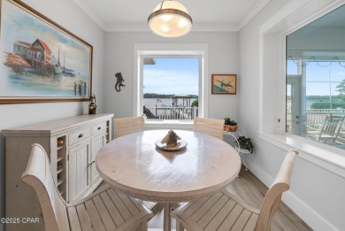 CUSTOM LAKE FRONT HOME WITH PRIVATE DOCK, BOATHOUSE FEATURING 6K on Sharks Tooth Golf Club in Florida - for sale on GolfHomes.com, golf home, golf lot