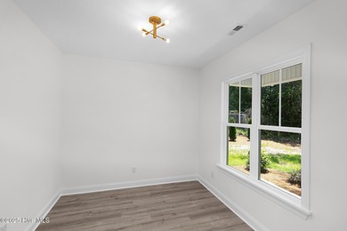 Welcome to 357 McCabe Road, a newly constructed 3-bedroom, 2 on Brandywine Bay Golf Club in North Carolina - for sale on GolfHomes.com, golf home, golf lot
