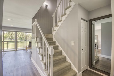 Fabulous modern remodel and premium location with stunning golf on Riverbend Golf Club in Florida - for sale on GolfHomes.com, golf home, golf lot