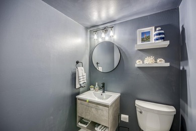 Fabulous modern remodel and premium location with stunning golf on Riverbend Golf Club in Florida - for sale on GolfHomes.com, golf home, golf lot