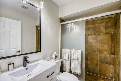 Fabulous modern remodel and premium location with stunning golf on Riverbend Golf Club in Florida - for sale on GolfHomes.com, golf home, golf lot