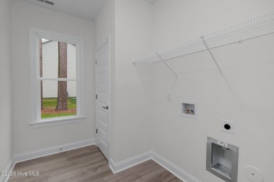 Welcome to 357 McCabe Road, a newly constructed 3-bedroom, 2 on Brandywine Bay Golf Club in North Carolina - for sale on GolfHomes.com, golf home, golf lot
