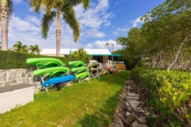 Fabulous modern remodel and premium location with stunning golf on Riverbend Golf Club in Florida - for sale on GolfHomes.com, golf home, golf lot