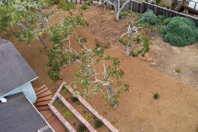 Opportunity awaits at this 4-bedroom, 2.5-bathroom home nestled on Monterey Peninsula Golf and Country Club in California - for sale on GolfHomes.com, golf home, golf lot