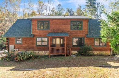Welcome home to your new cabin nestled among trees backing up to on The Rock At Jocassee in South Carolina - for sale on GolfHomes.com, golf home, golf lot