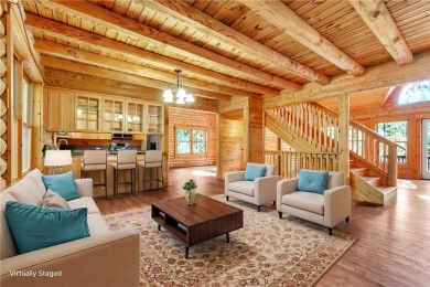 Welcome home to your new cabin nestled among trees backing up to on The Rock At Jocassee in South Carolina - for sale on GolfHomes.com, golf home, golf lot