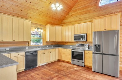 Welcome home to your new cabin nestled among trees backing up to on The Rock At Jocassee in South Carolina - for sale on GolfHomes.com, golf home, golf lot