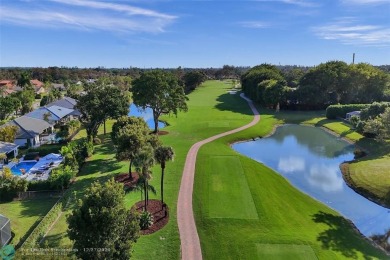 Located in prestigious Boca Woods Country Club this home is move on Boca Woods Country Club in Florida - for sale on GolfHomes.com, golf home, golf lot