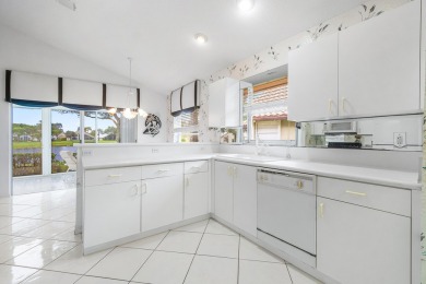 Enjoy STUNNING long lake views from this beautifully maintained on Westchester Golf and Country Club in Florida - for sale on GolfHomes.com, golf home, golf lot