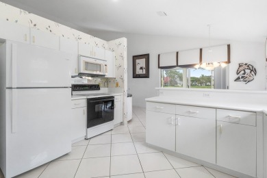 Enjoy STUNNING long lake views from this beautifully maintained on Westchester Golf and Country Club in Florida - for sale on GolfHomes.com, golf home, golf lot