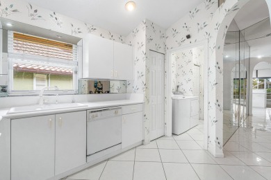Enjoy STUNNING long lake views from this beautifully maintained on Westchester Golf and Country Club in Florida - for sale on GolfHomes.com, golf home, golf lot