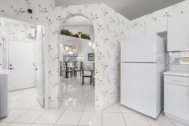 Enjoy STUNNING long lake views from this beautifully maintained on Westchester Golf and Country Club in Florida - for sale on GolfHomes.com, golf home, golf lot