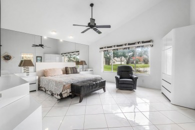 Enjoy STUNNING long lake views from this beautifully maintained on Westchester Golf and Country Club in Florida - for sale on GolfHomes.com, golf home, golf lot