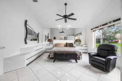 Enjoy STUNNING long lake views from this beautifully maintained on Westchester Golf and Country Club in Florida - for sale on GolfHomes.com, golf home, golf lot