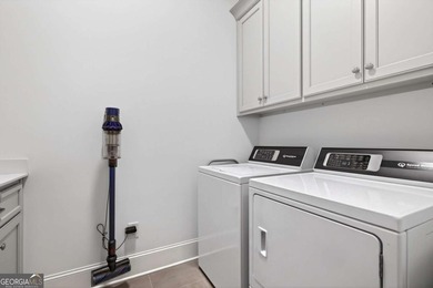 This STUNNING home nestled on the COVETED END LOT of the on North Fulton Golf Course in Georgia - for sale on GolfHomes.com, golf home, golf lot