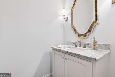 This STUNNING home nestled on the COVETED END LOT of the on North Fulton Golf Course in Georgia - for sale on GolfHomes.com, golf home, golf lot