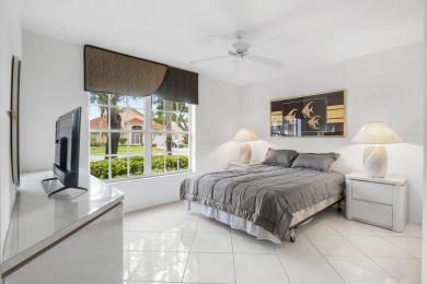 Enjoy STUNNING long lake views from this beautifully maintained on Westchester Golf and Country Club in Florida - for sale on GolfHomes.com, golf home, golf lot