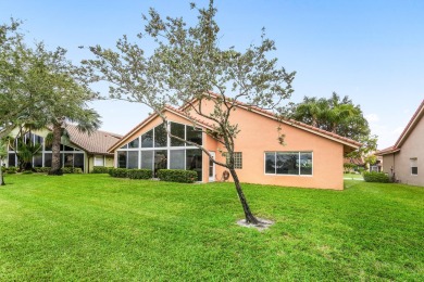 Enjoy STUNNING long lake views from this beautifully maintained on Westchester Golf and Country Club in Florida - for sale on GolfHomes.com, golf home, golf lot