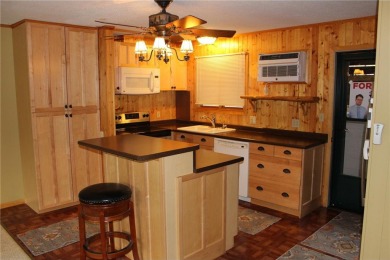 Condo on Pelican Lake is priced to sell and is a must see! It is on Breezy Point Golf Course Resort in Minnesota - for sale on GolfHomes.com, golf home, golf lot