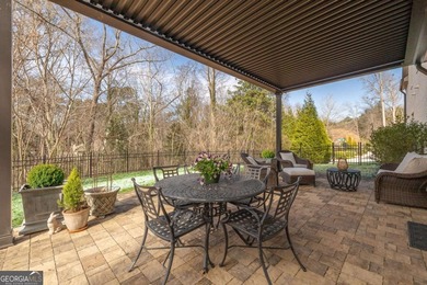 This STUNNING home nestled on the COVETED END LOT of the on North Fulton Golf Course in Georgia - for sale on GolfHomes.com, golf home, golf lot