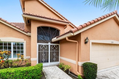 Enjoy STUNNING long lake views from this beautifully maintained on Westchester Golf and Country Club in Florida - for sale on GolfHomes.com, golf home, golf lot