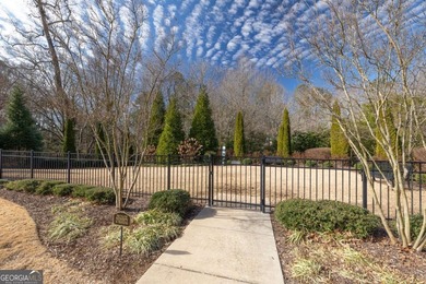 This STUNNING home nestled on the COVETED END LOT of the on North Fulton Golf Course in Georgia - for sale on GolfHomes.com, golf home, golf lot