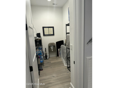 INCREDIBLE CURB APPEAL and stunning green-to-tee views of the #1 on Crow Creek Golf Club in North Carolina - for sale on GolfHomes.com, golf home, golf lot