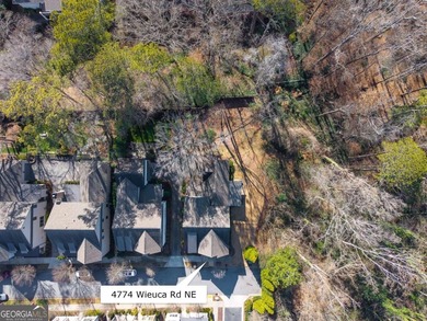 This STUNNING home nestled on the COVETED END LOT of the on North Fulton Golf Course in Georgia - for sale on GolfHomes.com, golf home, golf lot