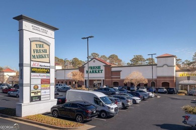 This STUNNING home nestled on the COVETED END LOT of the on North Fulton Golf Course in Georgia - for sale on GolfHomes.com, golf home, golf lot