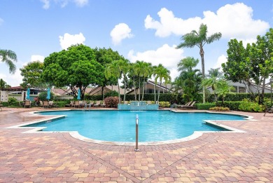 Enjoy STUNNING long lake views from this beautifully maintained on Westchester Golf and Country Club in Florida - for sale on GolfHomes.com, golf home, golf lot