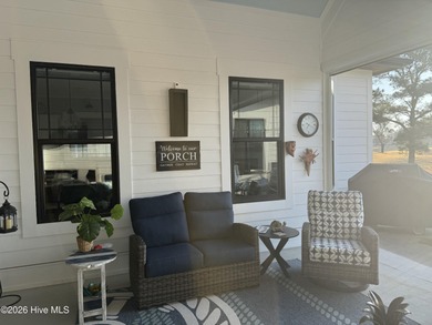 INCREDIBLE CURB APPEAL and stunning green-to-tee views of the #1 on Crow Creek Golf Club in North Carolina - for sale on GolfHomes.com, golf home, golf lot