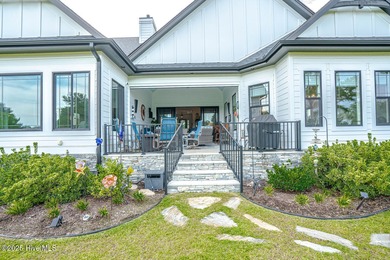 INCREDIBLE CURB APPEAL and stunning green-to-tee views of the #1 on Crow Creek Golf Club in North Carolina - for sale on GolfHomes.com, golf home, golf lot